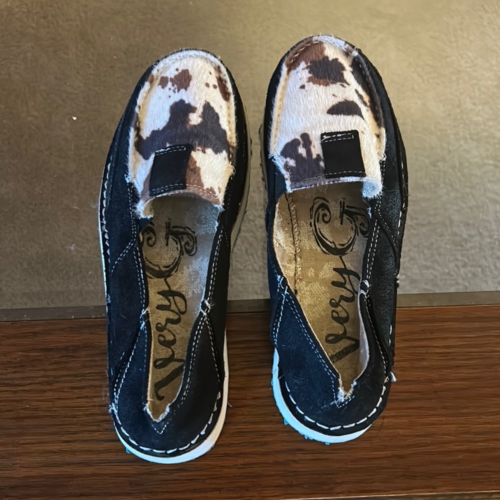 Women’s cow print loafers never worn